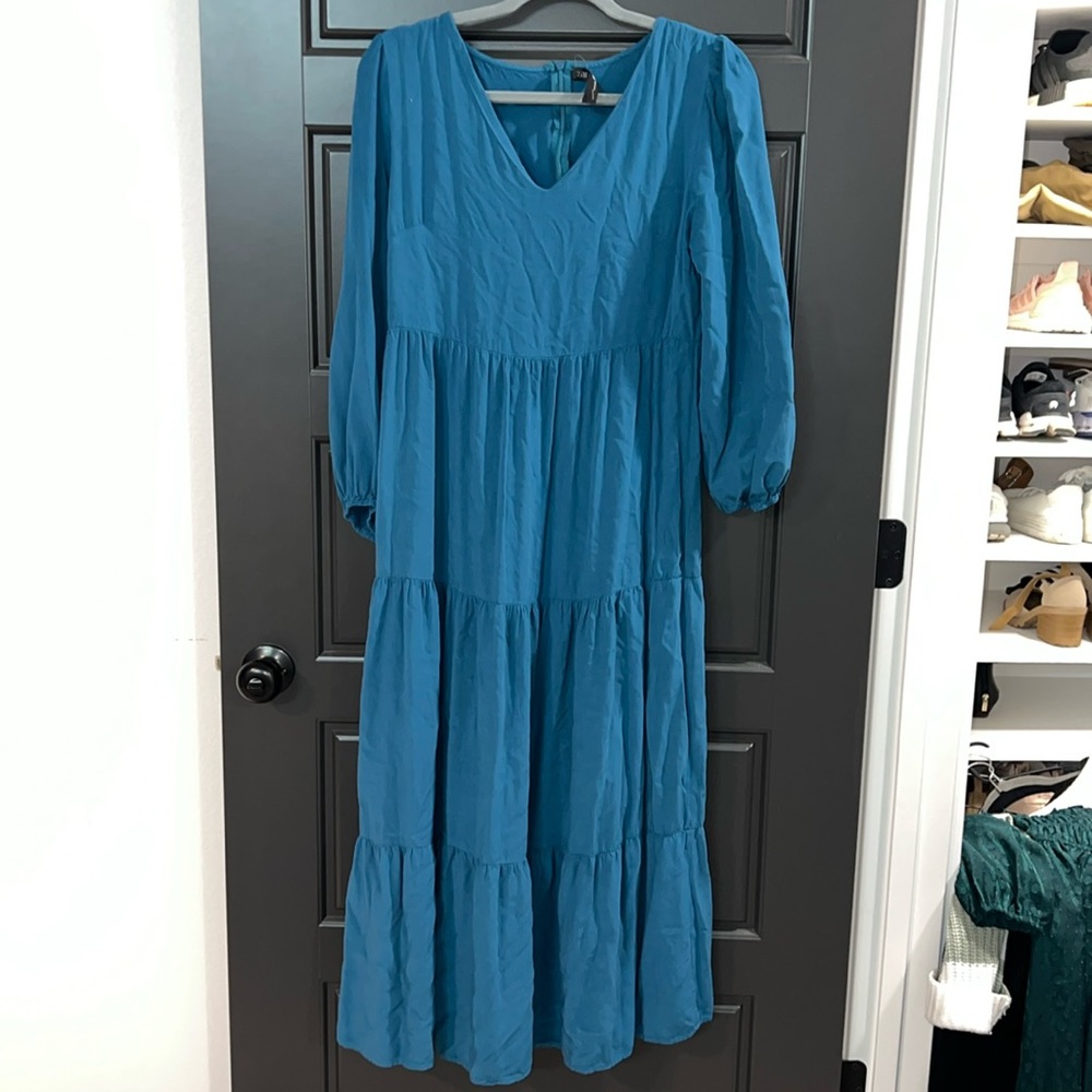 Blue maxi length dress with 3/4 length sleeves